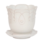 Jardins Du Monde Planter 7 in - Whitewash  Measurements: 7.25\W x 7.0\H x 7.25\L
Made in: Portugal
Made of: Ceramic

Care:  Dishwasher safe – avoid high heat. We recommend hand washing our collections as often as possible. Avoid cleaners that may contain citrus. 
